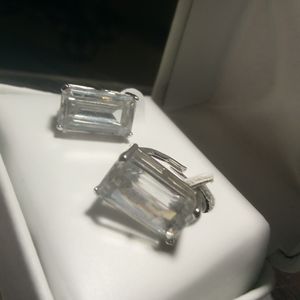 KJL Rock Crystal Recty cut earrings Signed KJL Rodium Plated apox 1/2 in.lenght